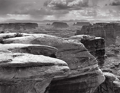 Monument Basin and Storm, Canyonlands National Park, Utah. Limited edition black and white photograph