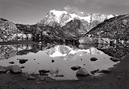 Pool and Mt. Shuksan, Washington. Black and white photograph