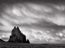 Shiprock and Storm. Near Shiprock, Arizona. Black and white photograph