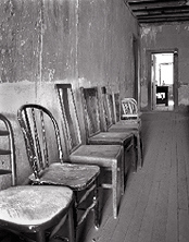 Chairs. Shakespeare, New Mexico. Black and white photograph