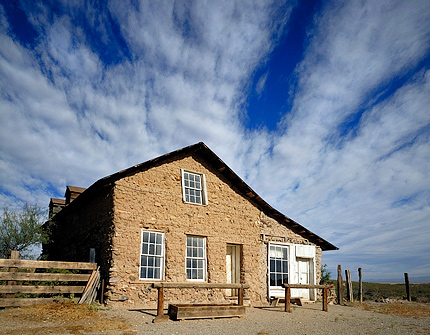 Hotel and Clouds, Ghost Town. Shakespeare, New Mexico. Color Photograph